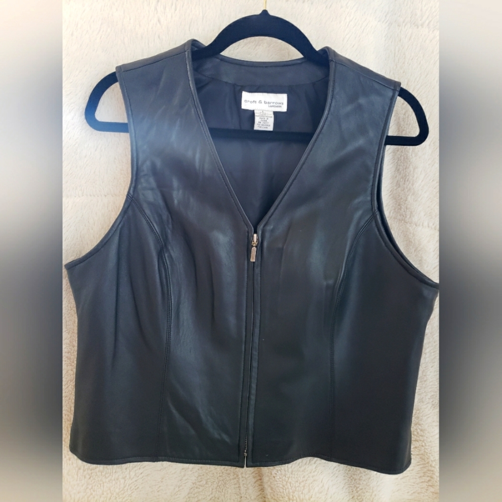 Womens genuine black leather vest. Size large.